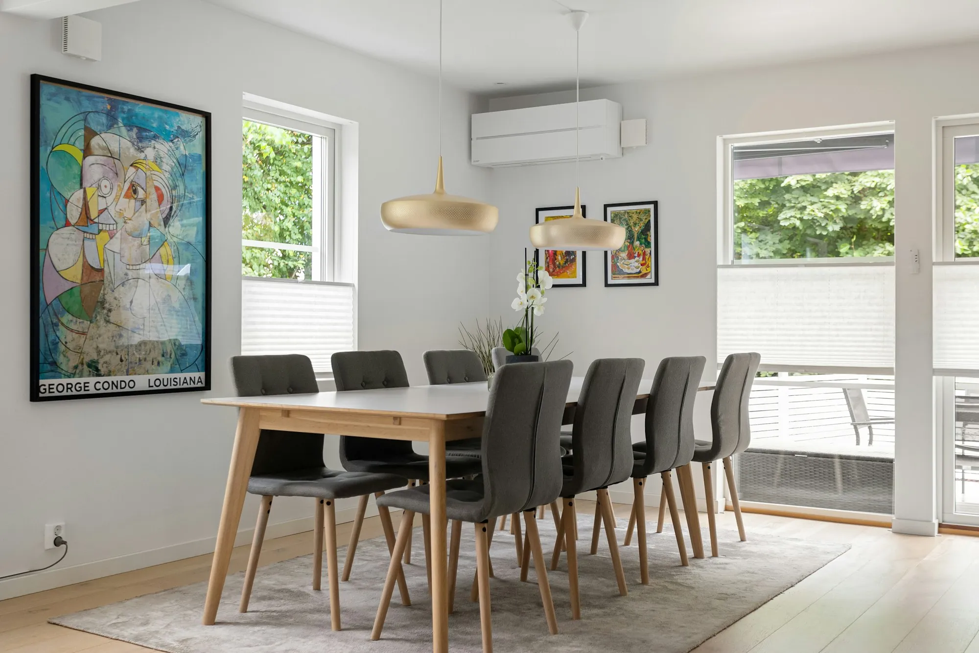 Dining room with a wall-mounted mini-split air conditioner